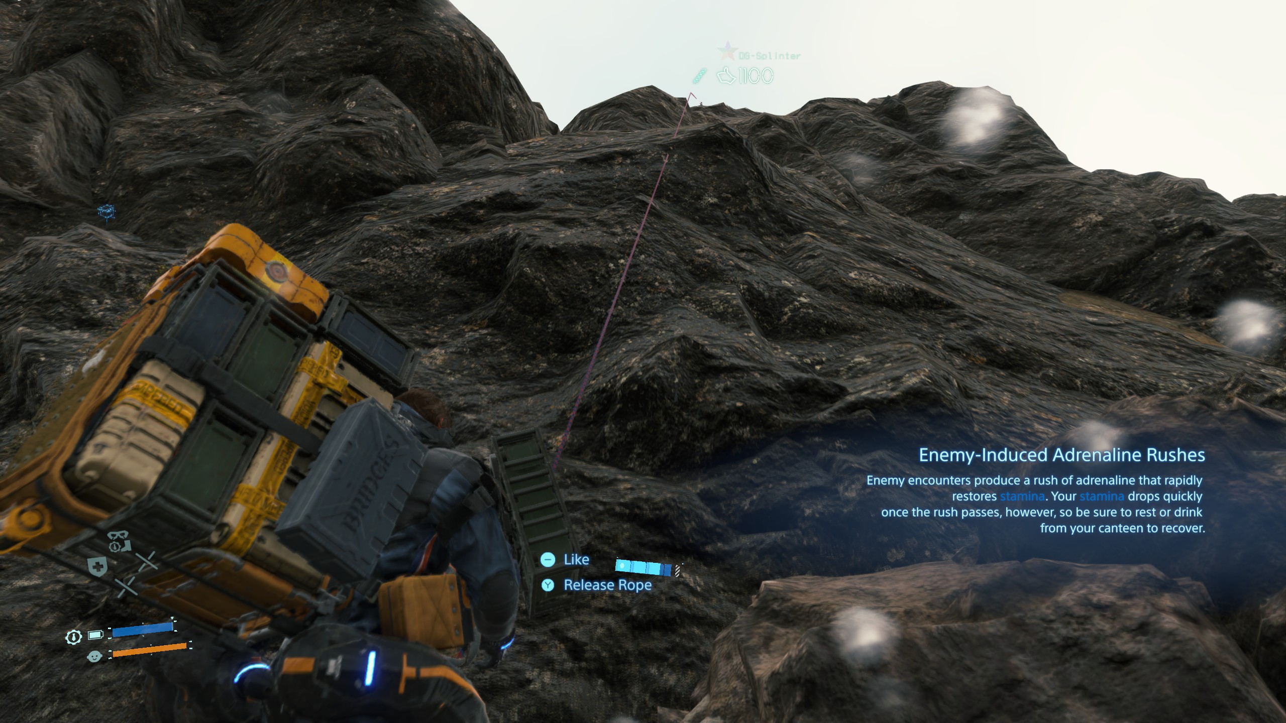 A picture of Death Stranding gameplay, showing the protagonist Sam PorterBridges attempting to climb a sheer cliff face using a rope that another playerleftbehind